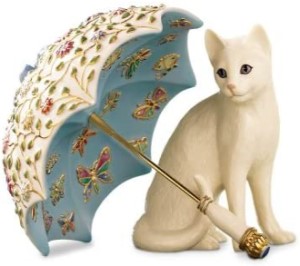a spring kitty with umbrella